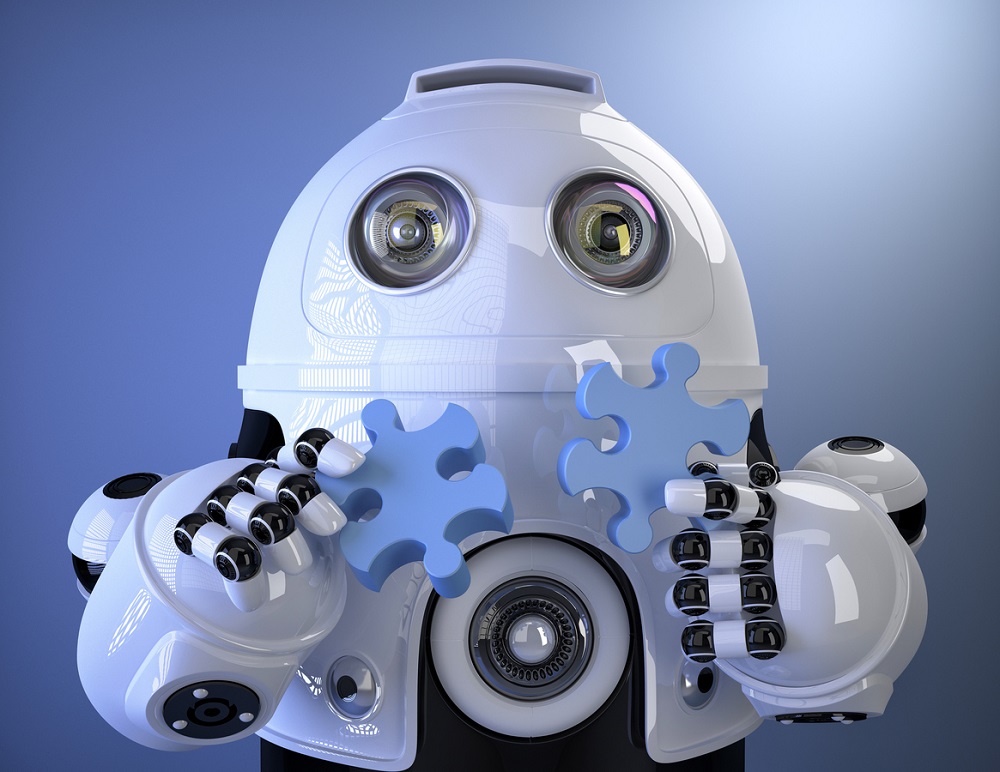 Un robot blanco sosteniendo dos piezas de un puzzle