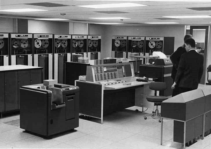 black and white photo of an IBM 7094 in the 1960s