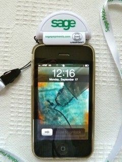 Sage credit card payment device attached to smartphone
