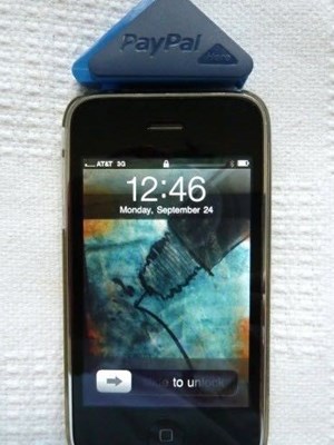 PayPal Here credit card payment device attached to smartphone
