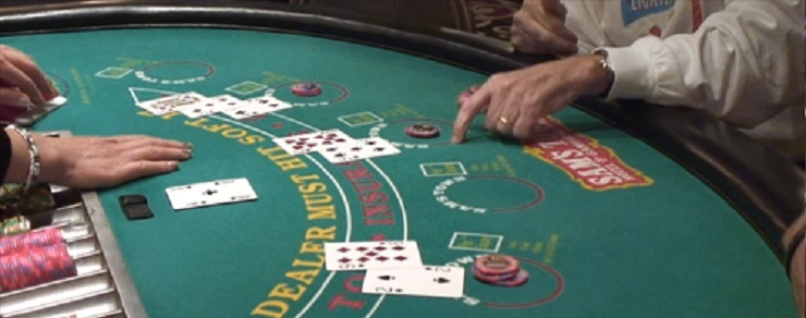 How to Play Blackjack at a Casino - Hit Sign