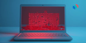 A laptop with red code text on the screen