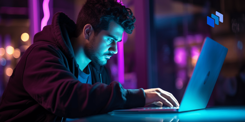 A man coding on his laptop