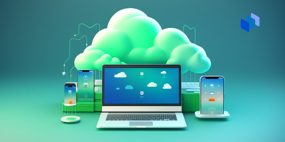 A laptop and mobile devices in front of a cloud