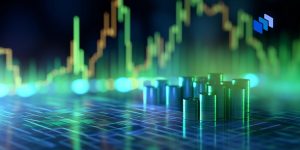 Coins in front of a trading chart