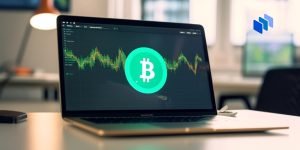 A Bitcoin on a laptop screen