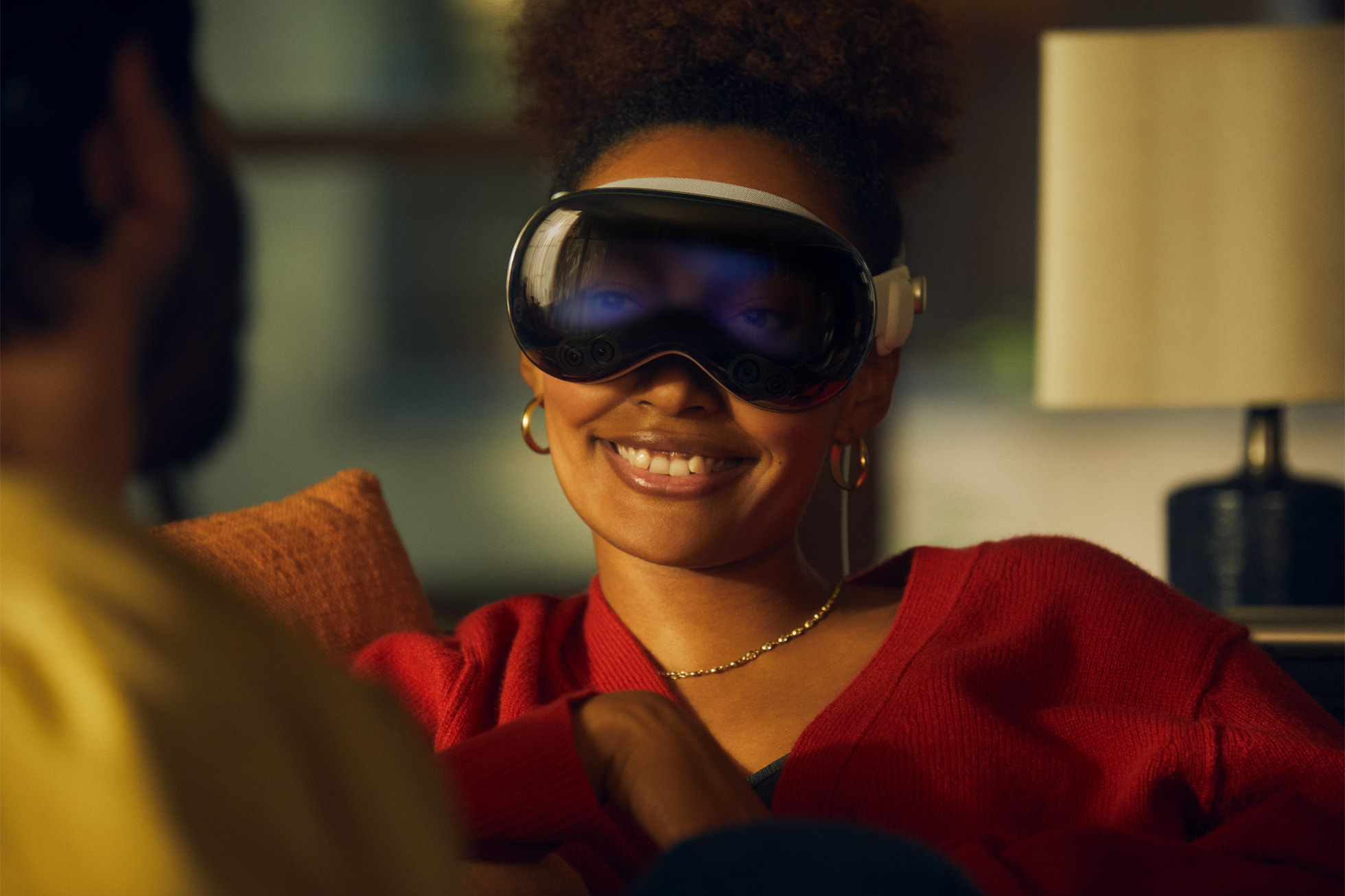 a woman wearing virtual reality goggles