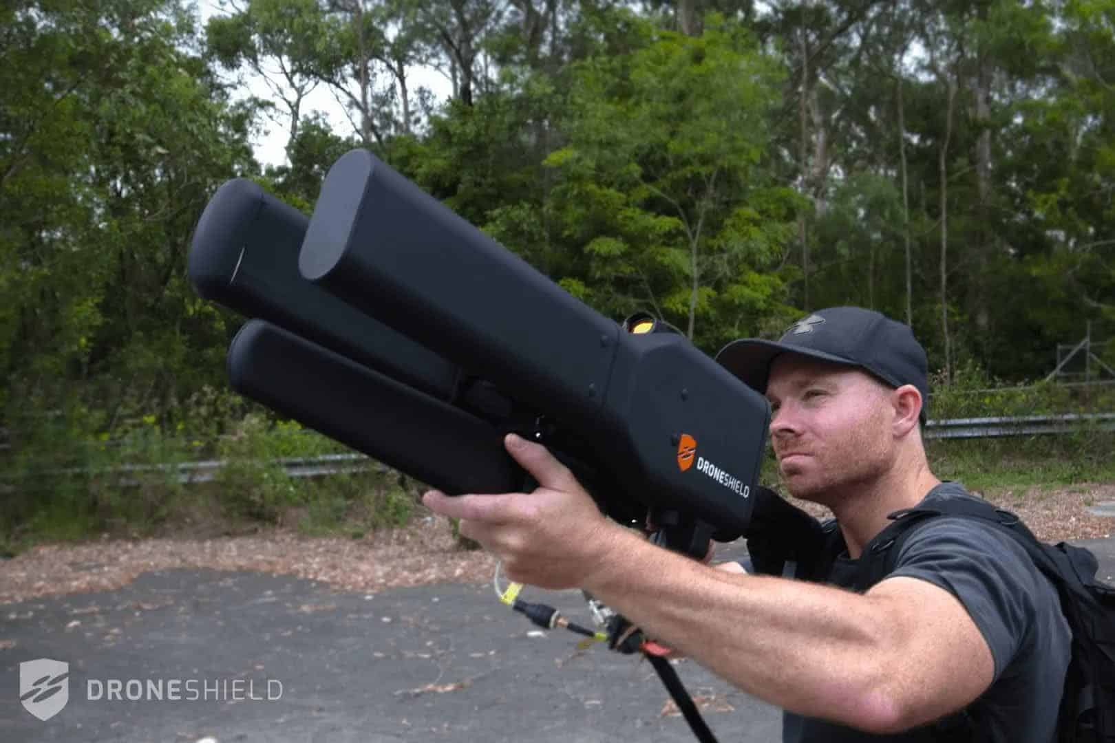 A man holding a wireless signal jammer