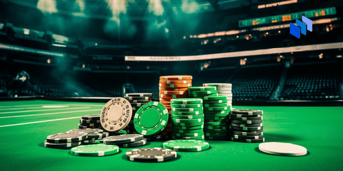 A stack of poker chips on a green betting table in a stadium setting, symbolizing the concept of handicaps in sports betting and gambling.
