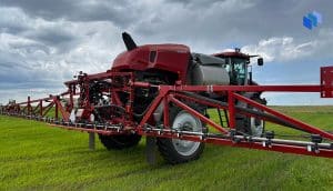 A machine equipped with an automated crop sprayer that uses AI.