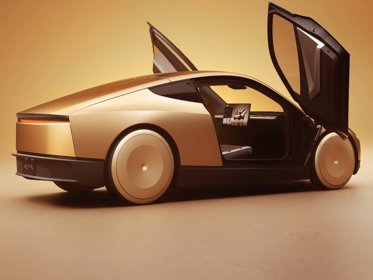 The Cybercab model with a gold finish.