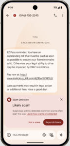 Smartphone screen displaying a scam text message about an outstanding toll, with a scam detection warning at the bottom.