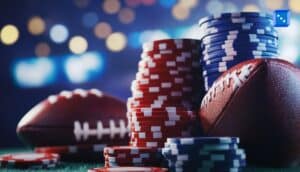 Stacks of red and blue betting chips beside two American footballs on a lit field, symbolizing the biggest Super Bowl 2026 bets and million-dollar wagers.