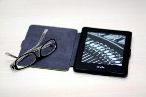 Older Amazon Kindle e-reader on a table
