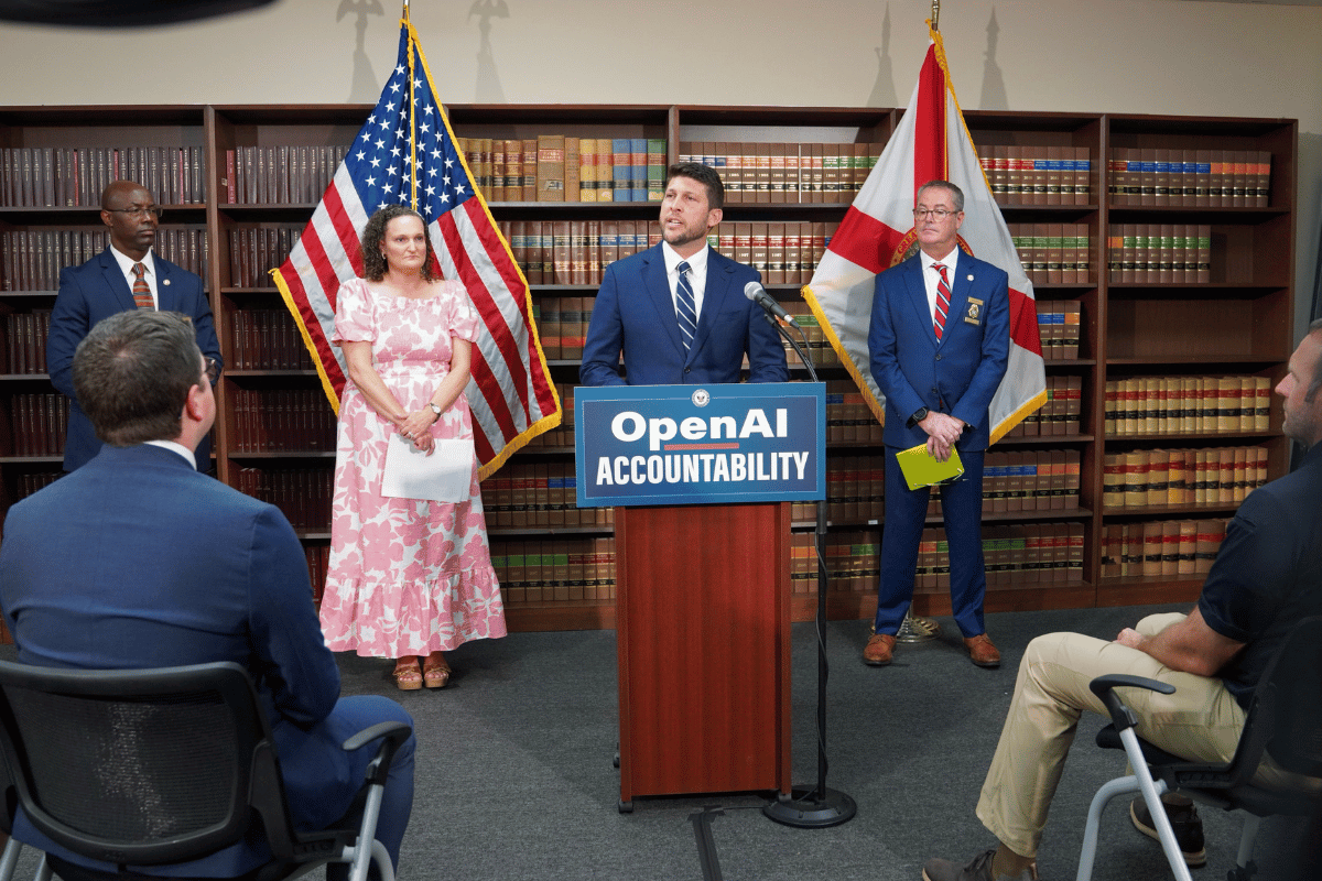 Florida Attorney General James Uthmeier addresses reporters at a Tallahassee press conference announcing Florida's lawsuit against OpenAI and CEO Sam Altman over ChatGPT safety and youth protection concerns.